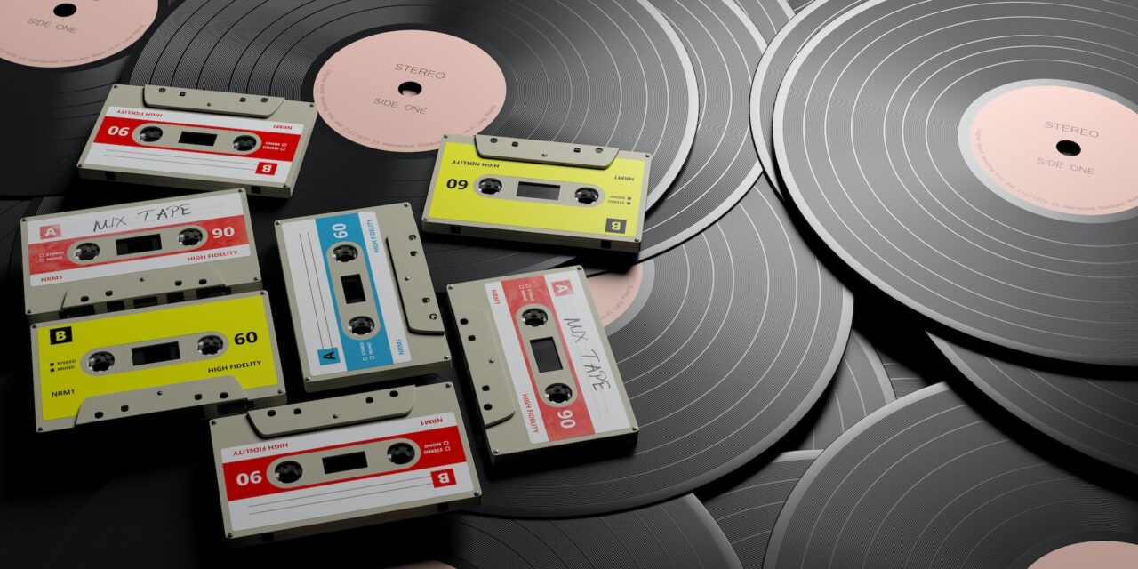 Vintage audio cassettes on wooden background, mix tape label, 3d illustration